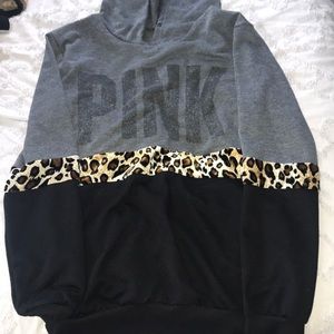 a pink shirt with a hood